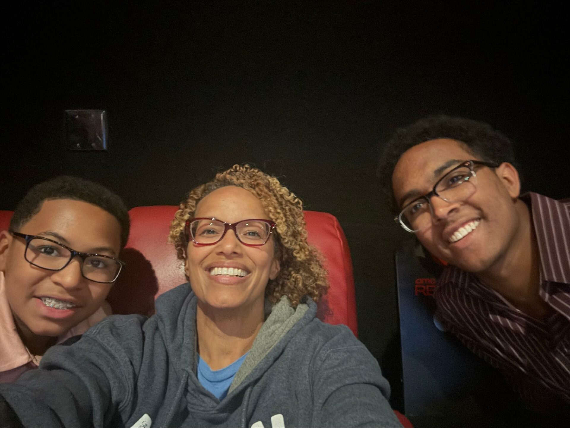 Heather Younger at the movies with 2 sons